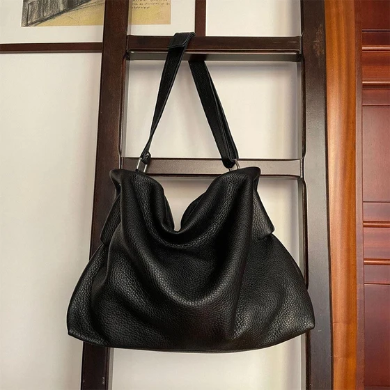 black-leather-bag-1.webp