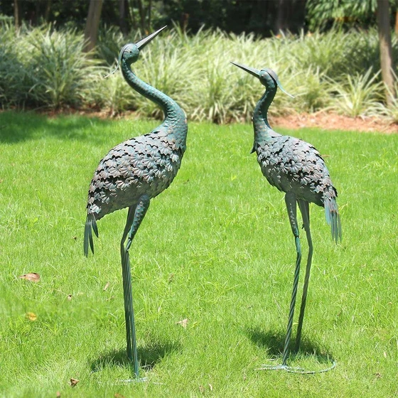 pair-metal-crane-statues-2.webp