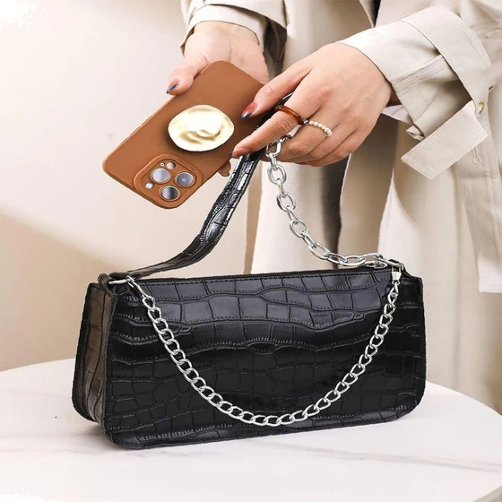 hand-carved-ladies-bag-2.webp