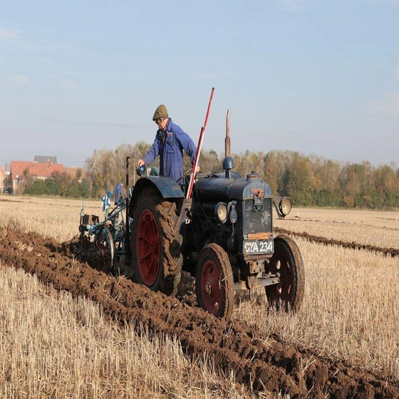 old-tractors-ploughing-1.webp