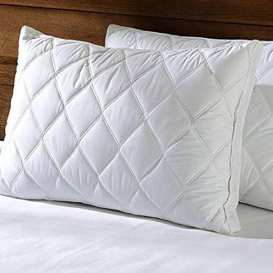 quilted-white-pillow-1.webp
