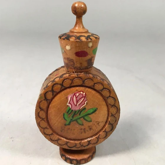 perfume-wooden-bottle-2.webp