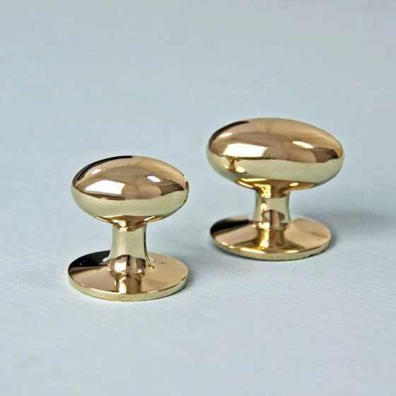 oval-brass-cupboard-knob-2.webp