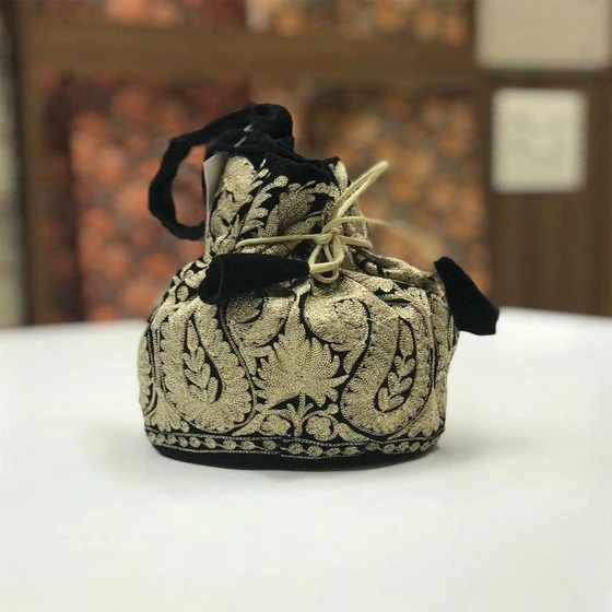 zari-work-potli-bag-2.webp