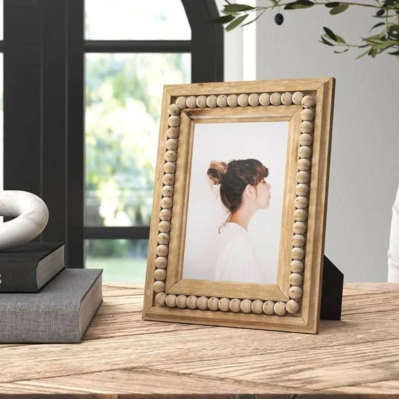 wood-carved-frame-2.webp