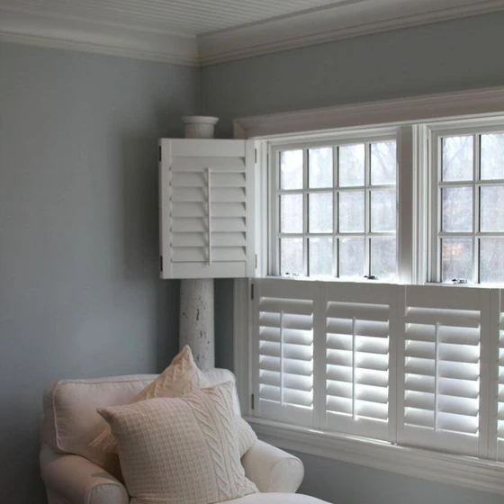 white-wooden-window-shutters-1.webp
