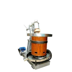 Marachekku Oil Machine — Stainless steel, brown colour