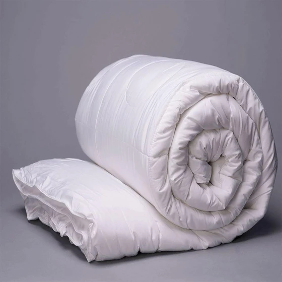 quilts-comforters-roll-2.webp