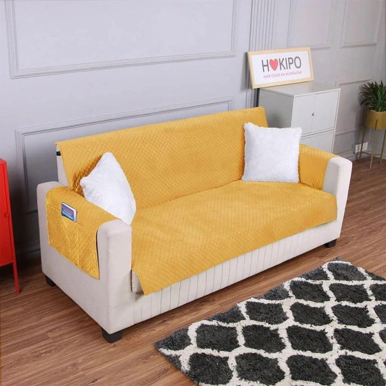 yellow-quilted-sofa-1.webp