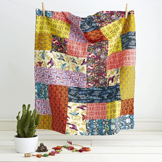 embroidered-kantha-blanket-21.webp